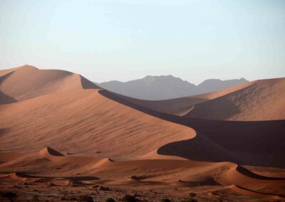 Panoramic view of the golden Erg Chebbi sand dunes in the Sahara Desert near Merzouga, Morocco