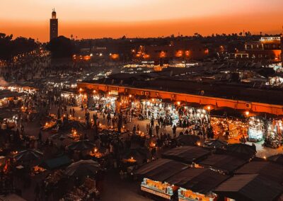 15-Day Morocco Discovery Tour from Fes Marrakech market at sunset during the 6 Day Hiking Tour in Morocco